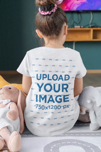 Back View T-Shirt Mockup Featuring a Little Girl Surrounded by Toys 