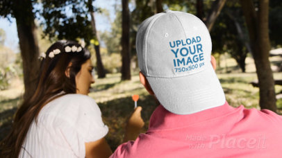 Dad Hat Video of a Man Talking with a Woman at a Park