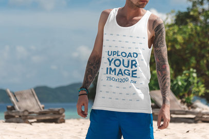 Tank Top Mockup of a Tattooed Man Enjoying the Beach