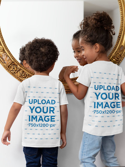 Back View Mockup of Two Kids Playing in Front on the Mirror 