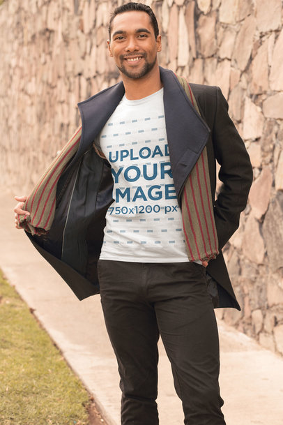 T-Shirt Mockup of a Happy Man with a Cool Fall Outfit 