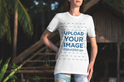 T-Shirt Mockup of a Woman Standing Outside a Beach Cabin 3347-el1
