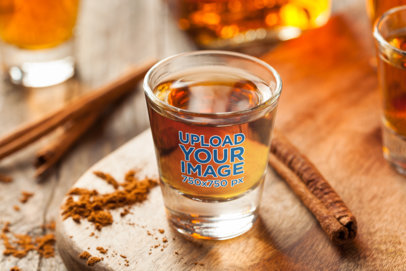Shot Glass Mockup Featuring Cinnamon Sticks 