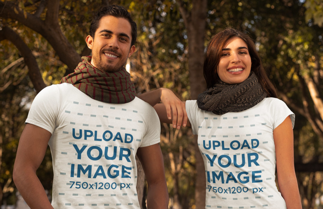 T-Shirt Mockup of a Couple at a Park During Fall 