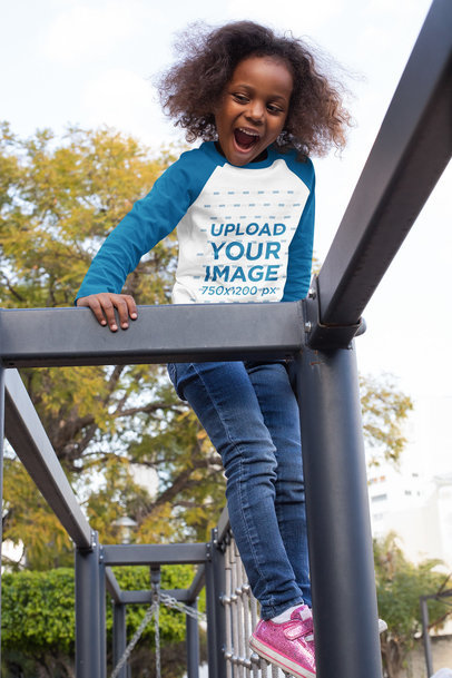 Raglan T-Shirt Mockup of a Little Girl Playing
