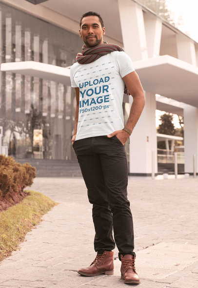 T-Shirt Mockup Featuring a Man with His Hands in His Pockets