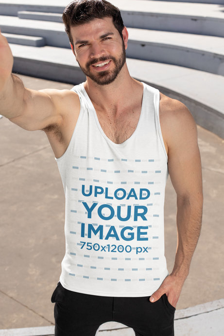 Tank Top Mockup Featuring a Man Taking a Selfie on the Street