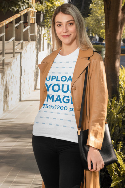 T-Shirt Mockup Featuring a Woman Smiling in Autumn 