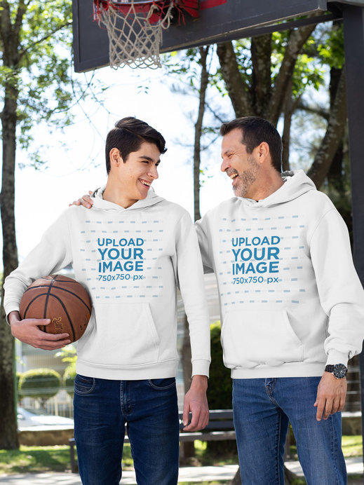 Pullover Hoodie Mockup Featuring a Father and His Son at a Basketball Court 