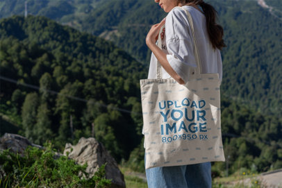 Tote Bag Mockup of a Woman at the Mountains 3134-el1
