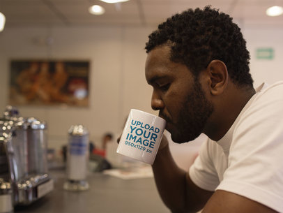 Mug Mockup Featuring a Man Drinking Coffee at a Diner 12328a