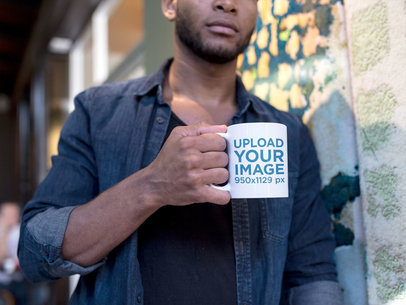 Young Man Holding a Mug Mockup