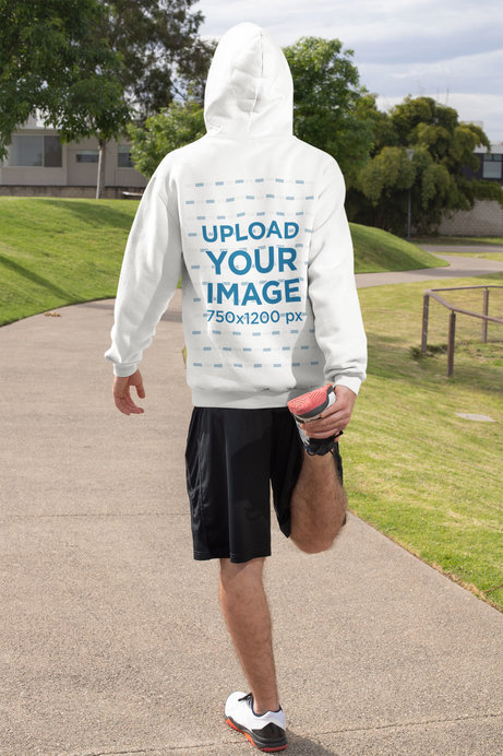 Hoodie Mockup of the Back View of a Man Getting Ready to Run