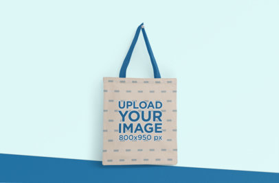 Mockup of a Hanging Tote Bag with Customizable Strap 3123-el1