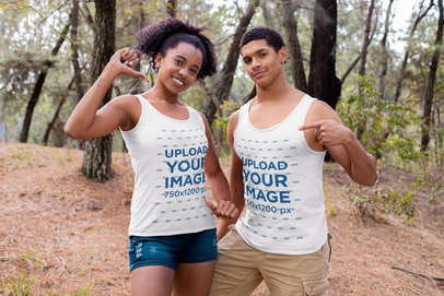 Mockup of a Proud Couple Showing Off Their Tank Tops