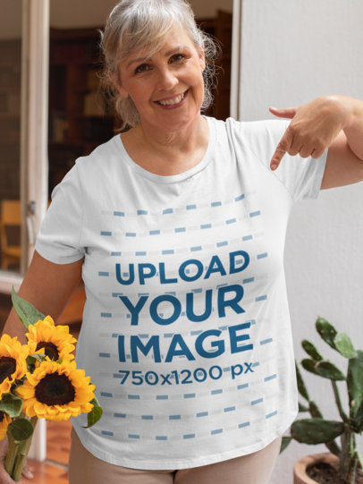 Mockup of an Elderly Woman Pointing at Her T-Shirt