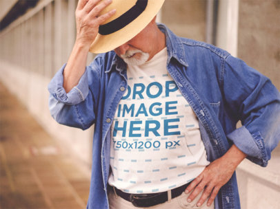 Stylish White Senior Man Wearing a Round Neck Tee Mockup with a Hat