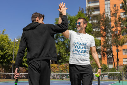 T-Shirt Mockup of a Man Playing Tennis with His Son