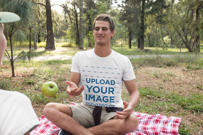 T-Shirt Mockup of a Man Having Fun at a Picnic