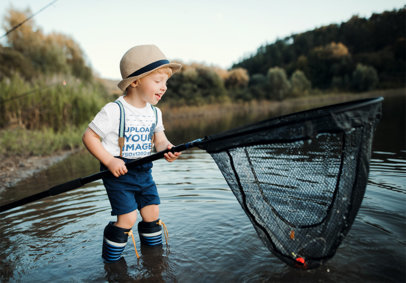 T-Shirt Mockup Featuring a Boy Holding a Fishing Net 