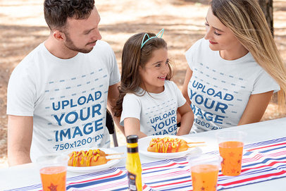 T-Shirt Mockup of a Family Eating Snacks on the 4th of July