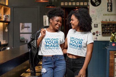 Crop Top Mockup Featuring Two Friends Having Fun at a Restaurant 