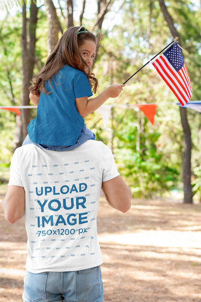 Back-View Tee Mockup of a Father Carrying His Daughter on His Shoulders