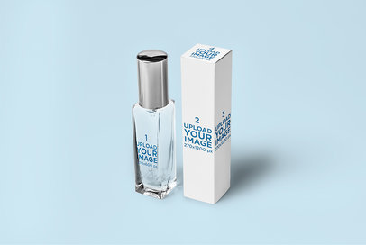 Mockup of a Small Perfume Bottle Placed Next to Its Box 