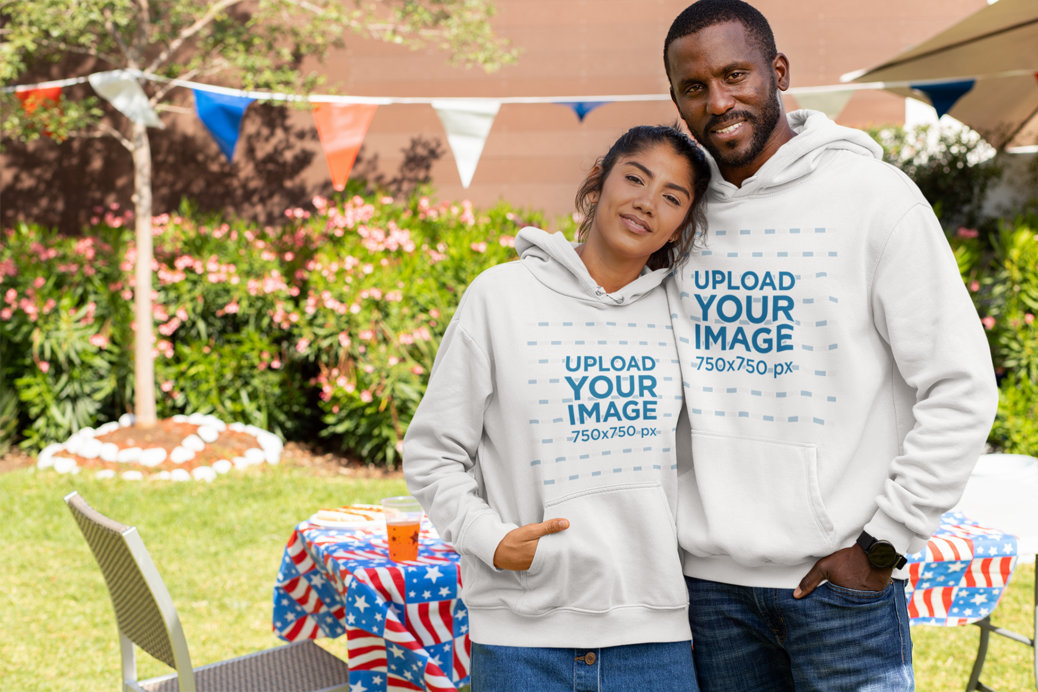 Hoodie Mockup of a Couple Celebrating the 4th of July