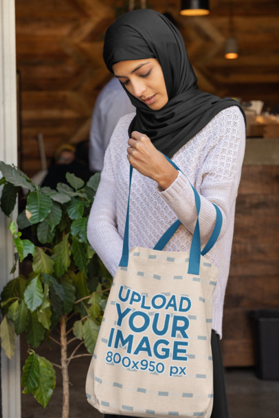 Tote Bag Mockup of a Woman Looking Inside Her Bag 