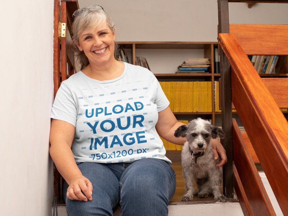 T-Shirt Mockup of a Happy Woman Sitting on the Stairs with her Dog
