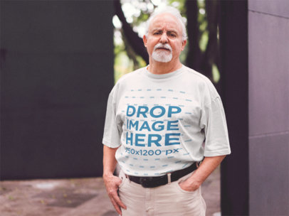 Round Neck Tee Mockup of a Senior Man in the Street