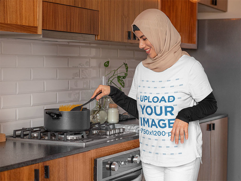 T-Shirt Mockup Featuring a Woman Cooking 