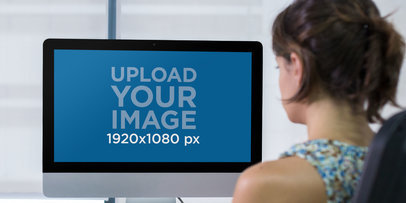 Woman Working on her iMac Mockup in a Modern Office