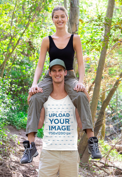 Tank Top Mockup Featuring a Woman Sitting on a Man's Shoulders After a Hike 32228