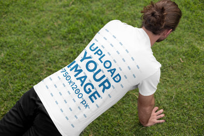 Back View Mockup of a Man with a T-Shirt Doing Push-Ups 