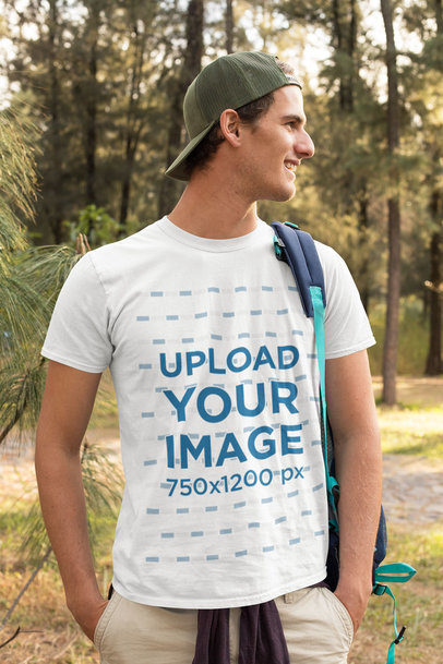 T-Shirt Mockup Featuring a Hiker by the Woods