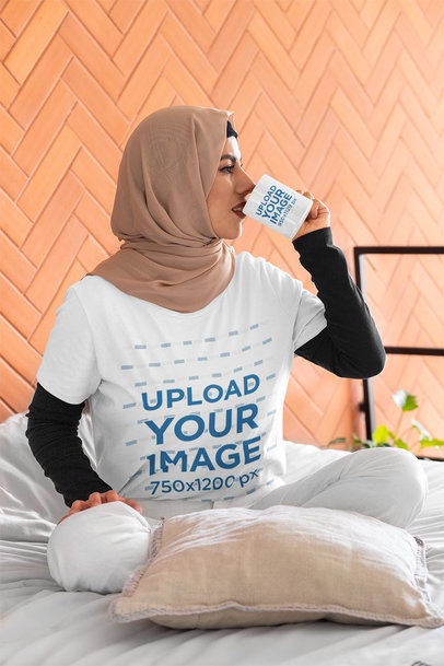 T-Shirt Mockup Featuring a Woman at Her Home Drinking Coffee from an 11 oz Mug 