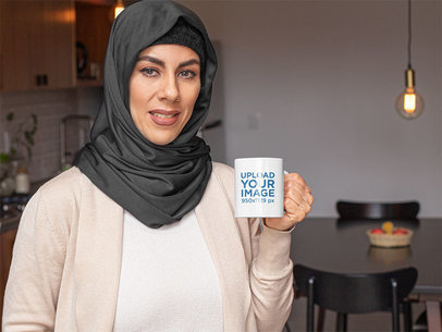 11 oz Mug Mockup of a Woman with a Hijab Having a Coffee at Home