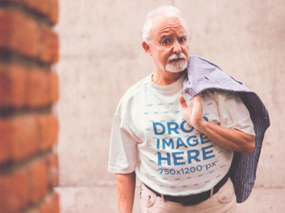T-Shirt Mockup of a Senior Man in the Street