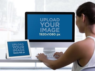 iMac and iPad Mockup Featuring a Woman Working at her Desk