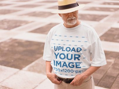 T-Shirt Mockup of a Stylish Elder Man in the Street