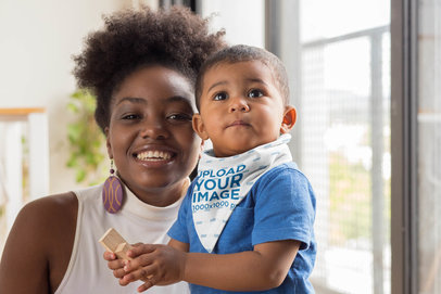 Sublimated Bib Mockup of a Mom Carrying His Baby Boy