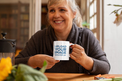 Mockup of a Woman Drinking From an 11 oz Mug at Home 