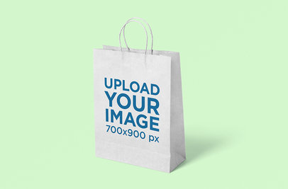 Paper Bag Mockup Featuring a Plain Color Background 