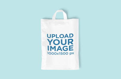 Mockup Featuring a Customizable Plastic Bag Placed on a Colored Surface
