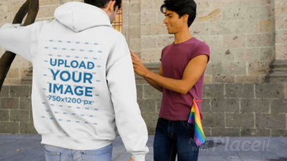 Video of a Man Wearing a Hoodie Posing for a Picture