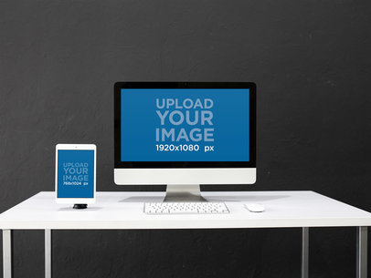 White iPad Mini and iMac on a Work Desk Mockup