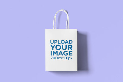 Minimalistic Mockup of a Gift Bag on a Colored Surface