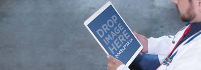iPad Pro Mockup Used by a Male Doctor a12398